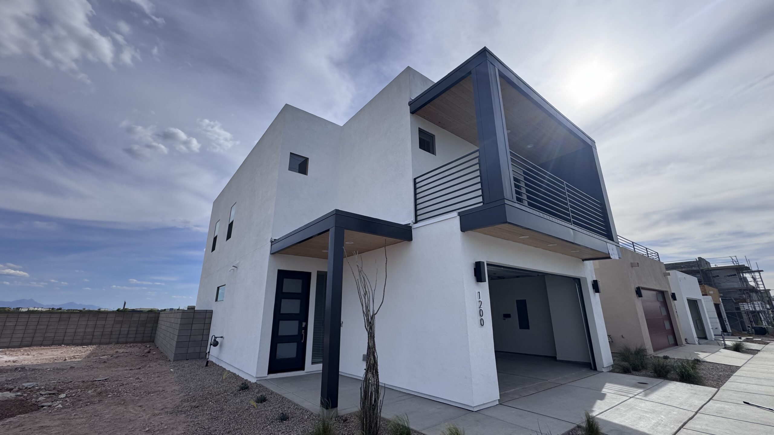 Multi-story commercial building with mixed metal siding