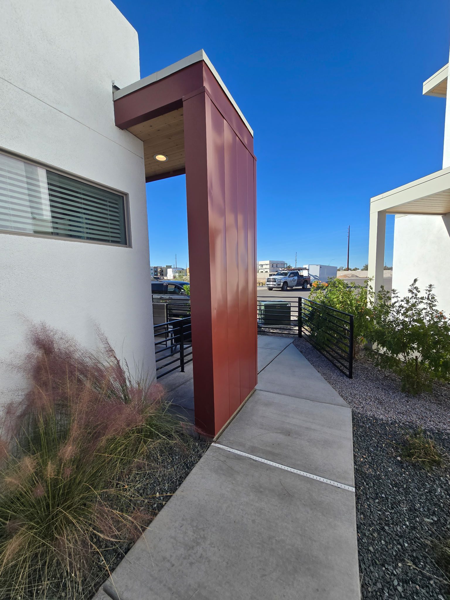 Multi-story commercial building full elevation with metal siding