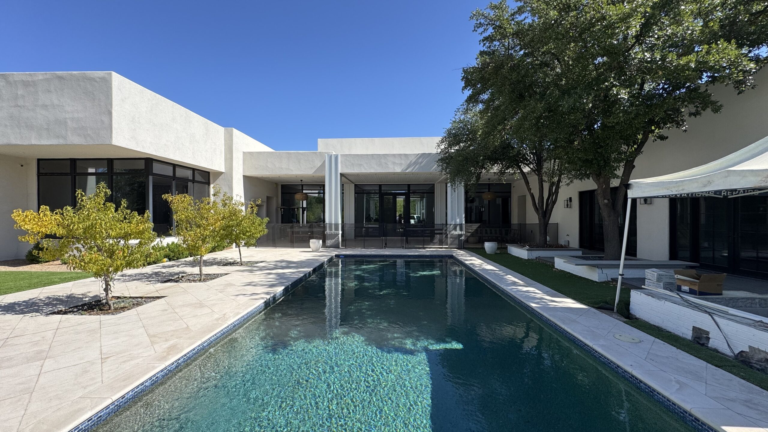 Multi-story building with warm wood-tone metal cladding
