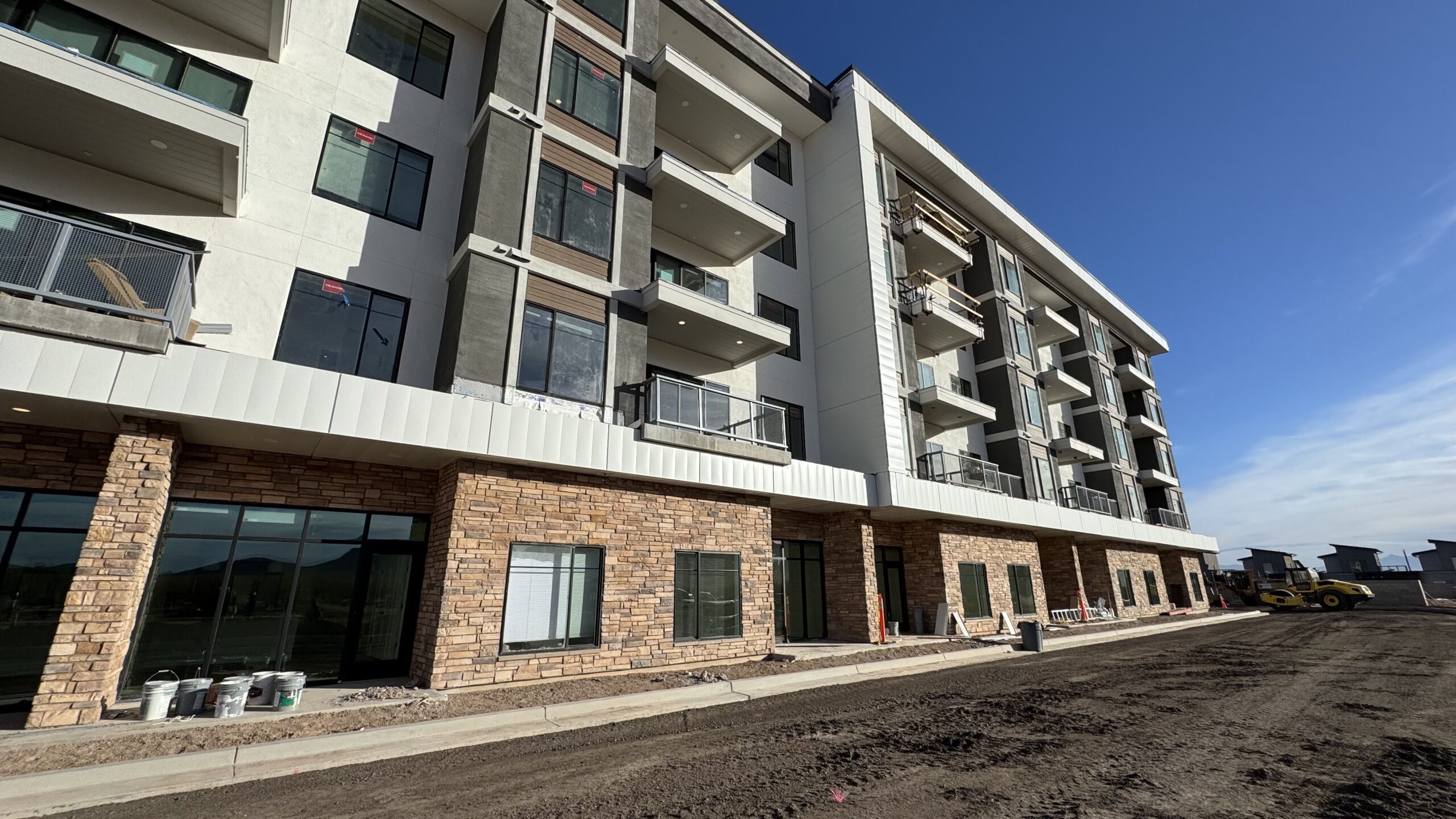 Large multi-unit building with metal siding panels